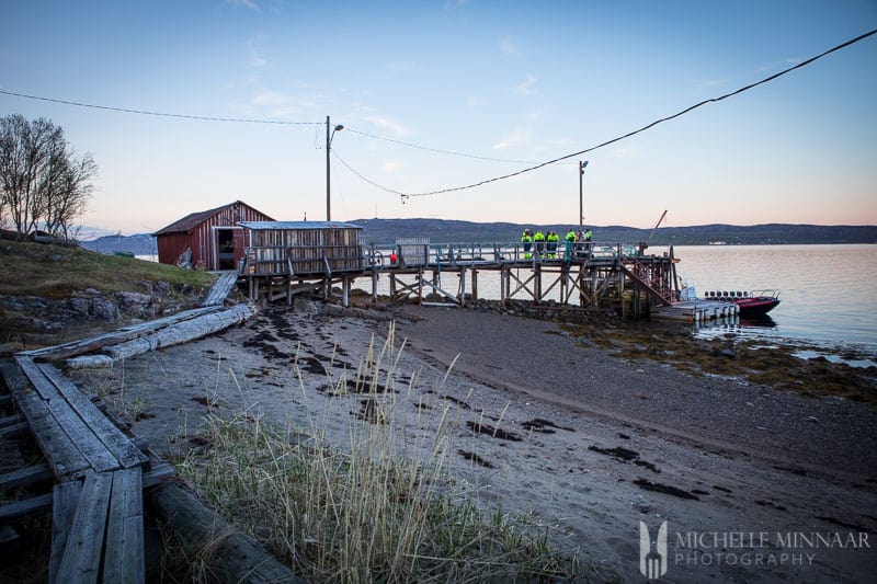 A landscape shot of people standing on the King Crab Safari dock 