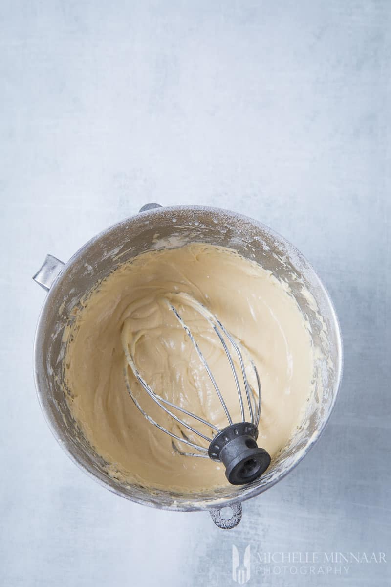 Muffin batter inside of a mixing bowl