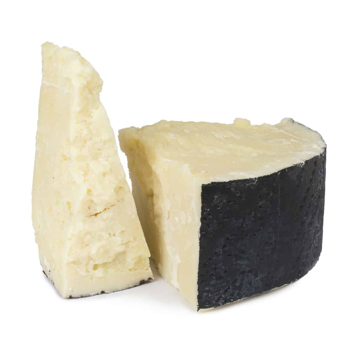 Two chunks of percorino cheese as a manchego cheese substitutes.