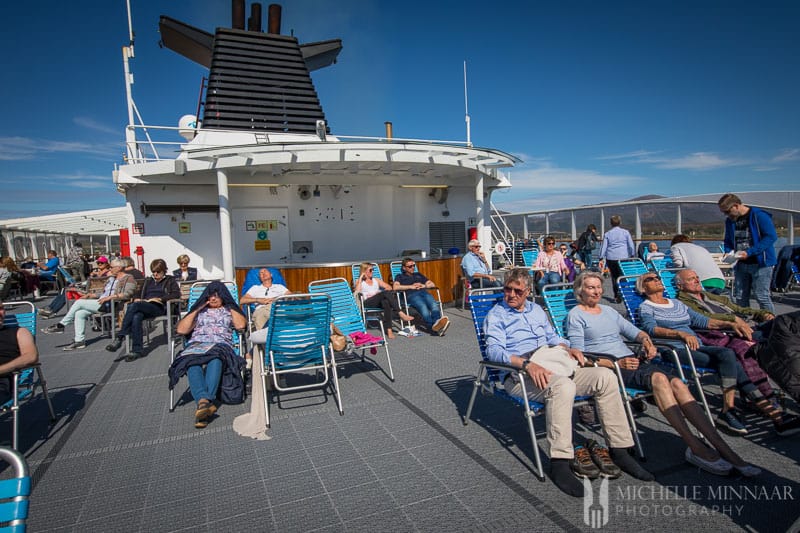 People on the sun bathing deck of the hurtigruten cruise 