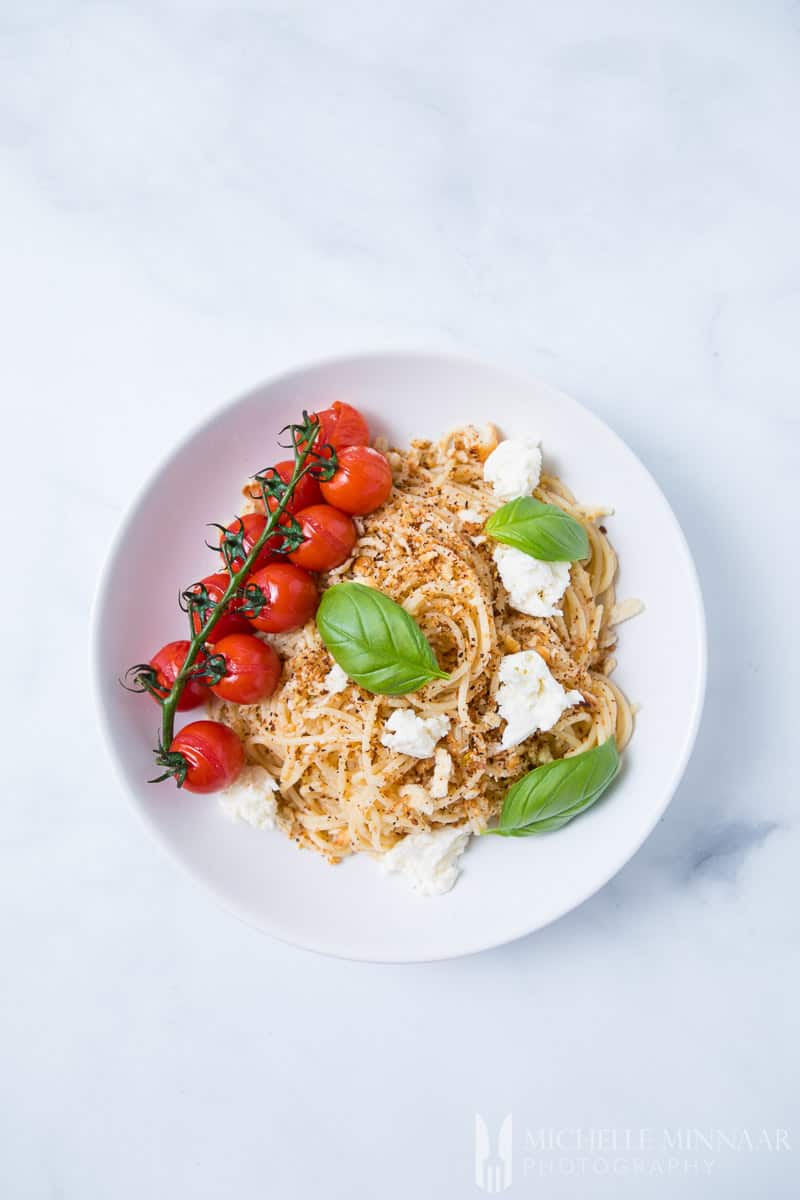 An aerial view of Pangritata Mozzarella Pasta Tomato 