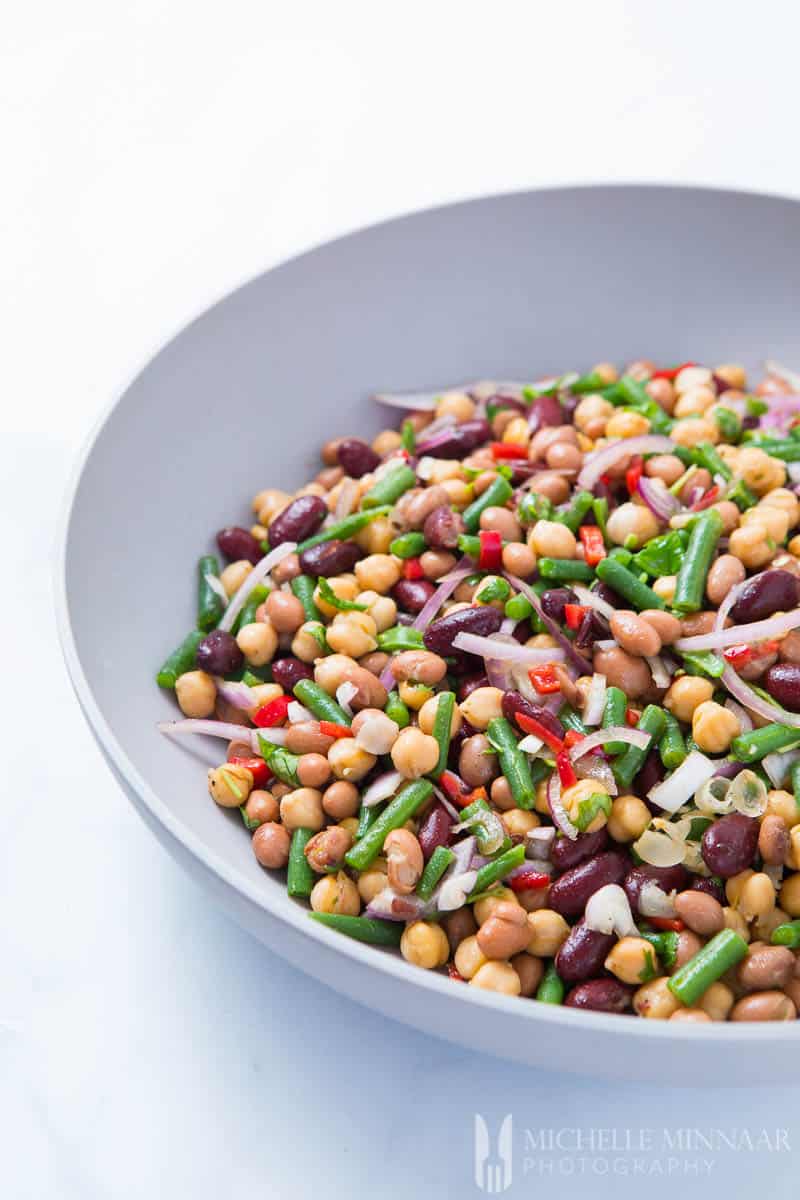 a bowl of 4 bean salad and onions 