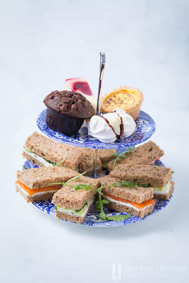 Desserts on a two tier blue and white plate