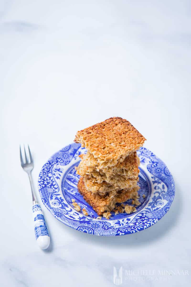 Sugar Free Flapjacks on a blue and white plate and fork 