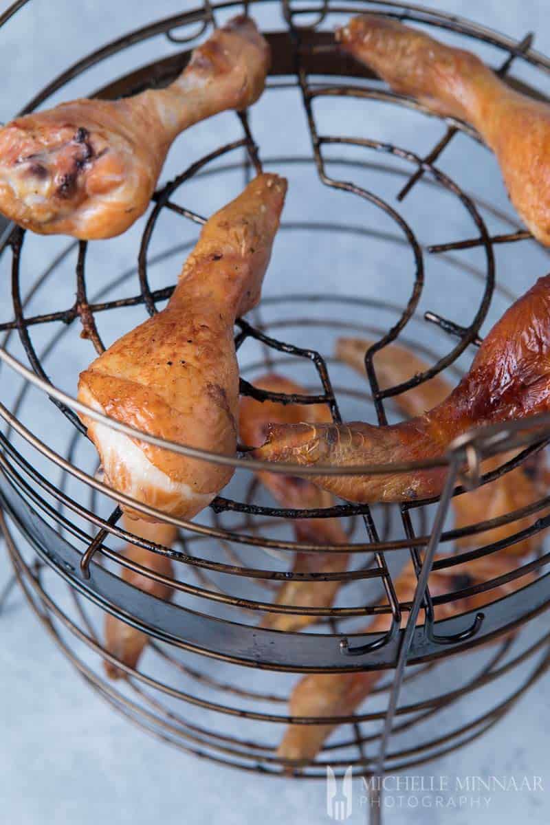 Chicken Drumsticks in wire basket