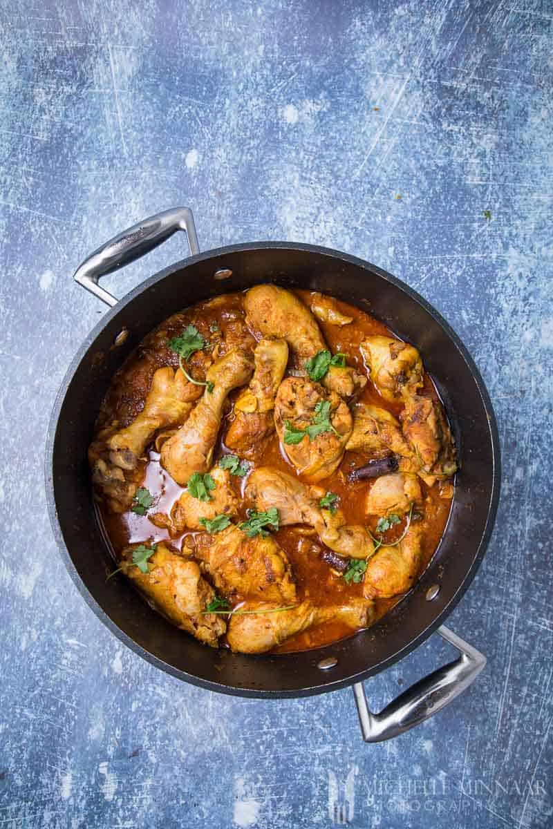 Indian Chicken Curry in a sauce pan 