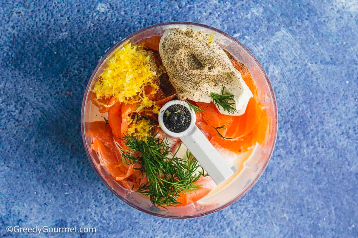 Ingredients for smoked salmon pate in a blender.