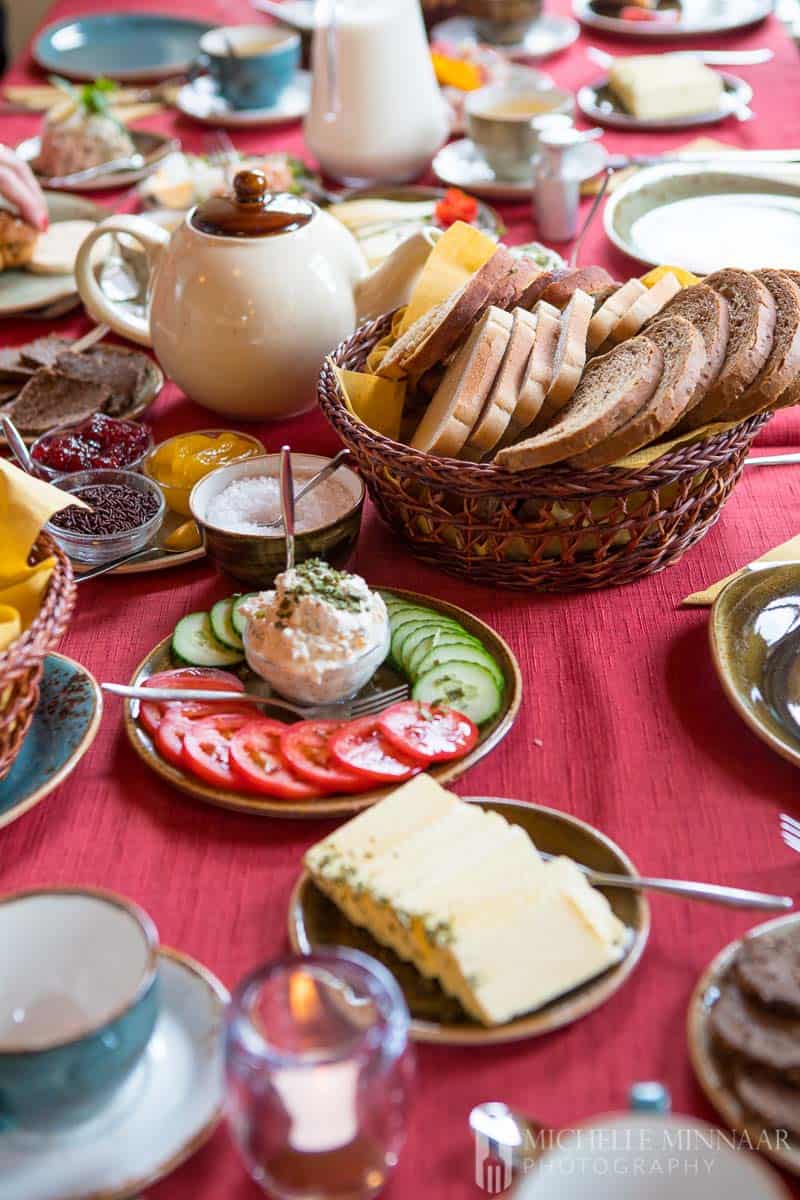 Sliced tomatoes, cucumbers and bread for high tea