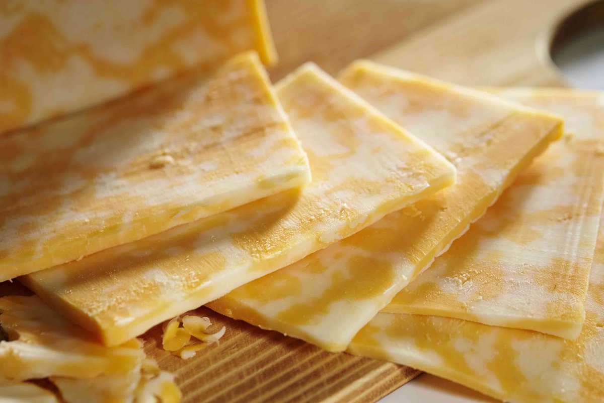 Yellow and white cheese slices.