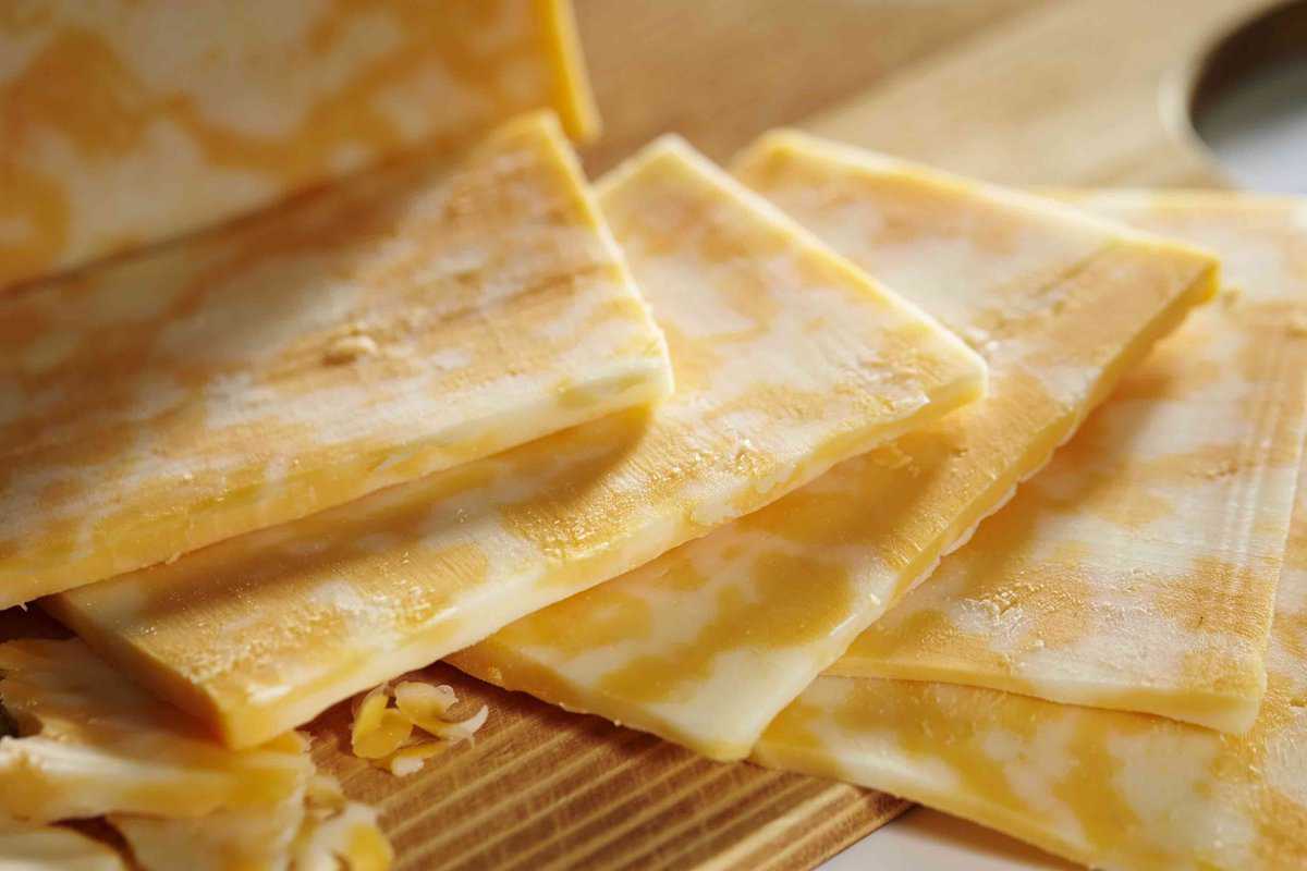 Yellow and white cheese slices.