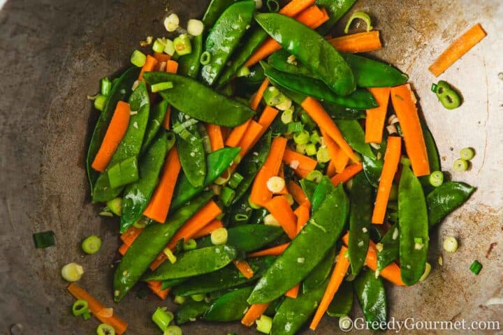 Frying vegetables.