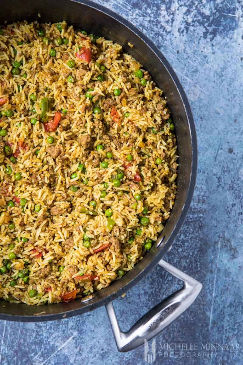 A close up of keema rice in a skillet 