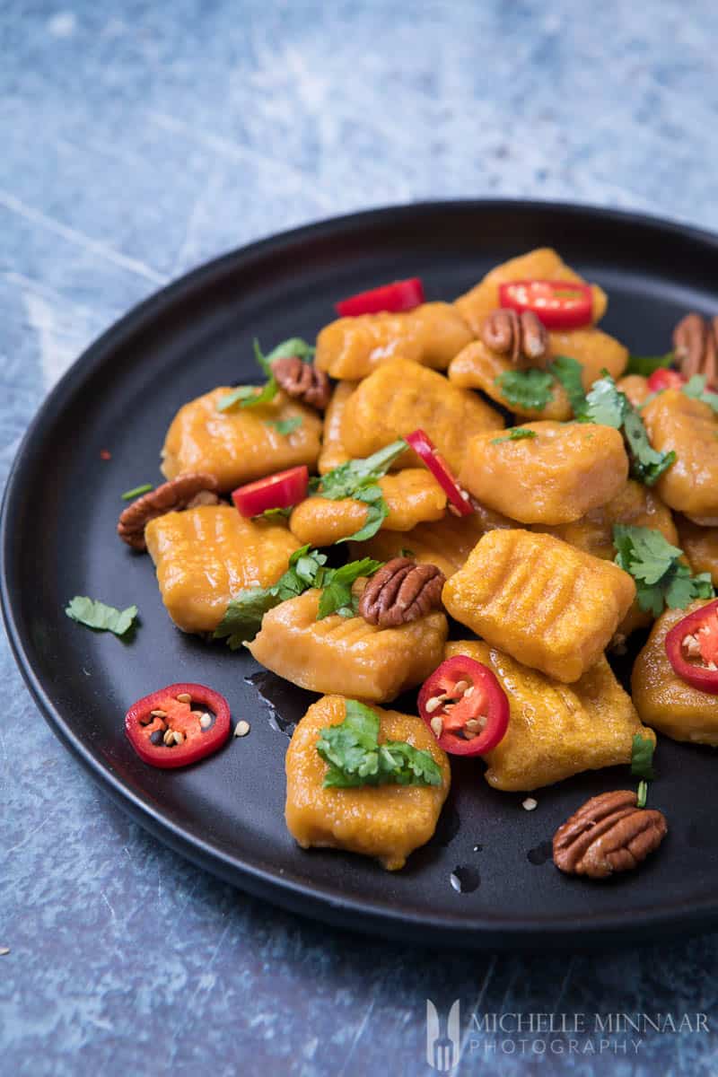 A close up of vegan sweet potato gnocchi