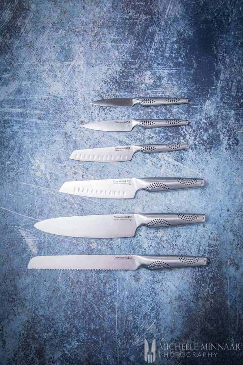 a set of 6 silver knives