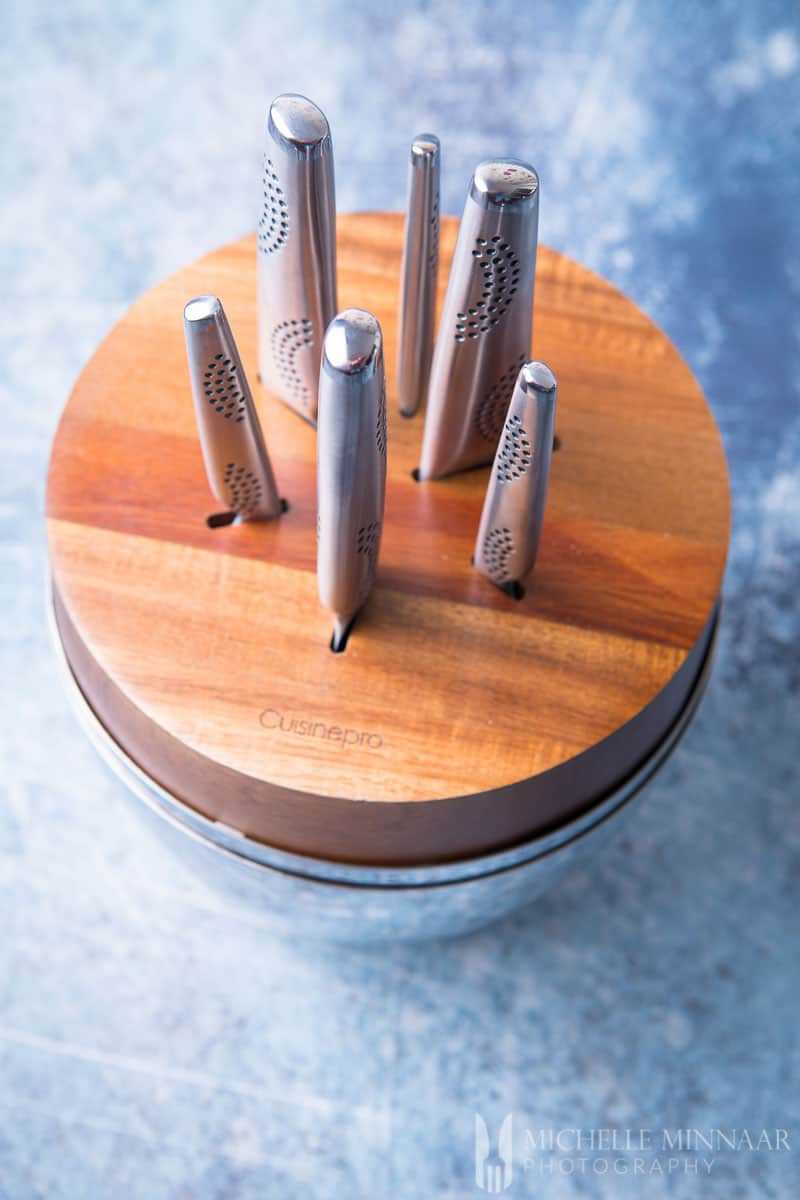 Knives in a wooden circle holder