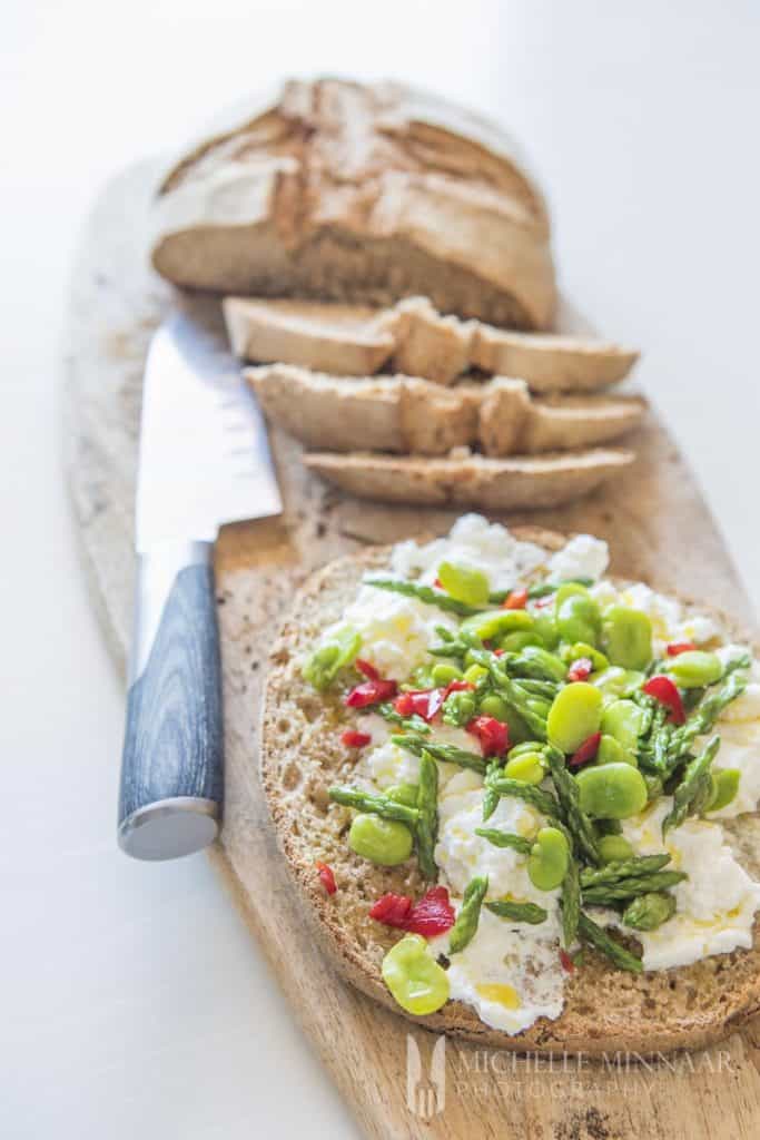 A loaf of bread with an Asparagus Chilli spread 