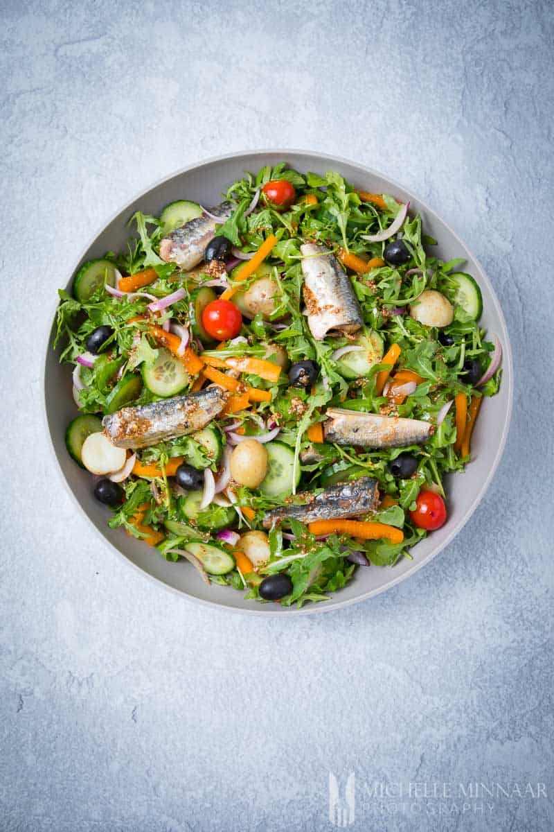 A bowl of fresh sardine salad