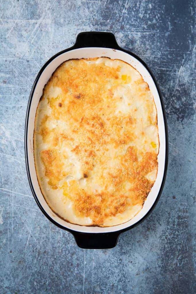 cod au gratin in a white dish 