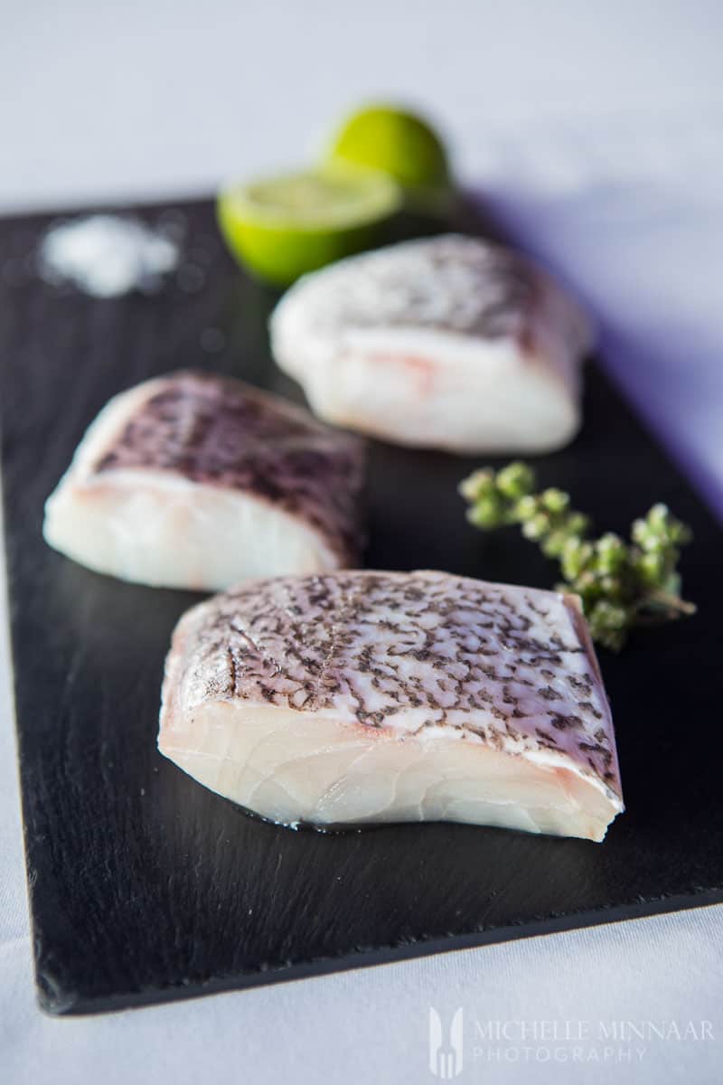 A close up of raw white fish fillets