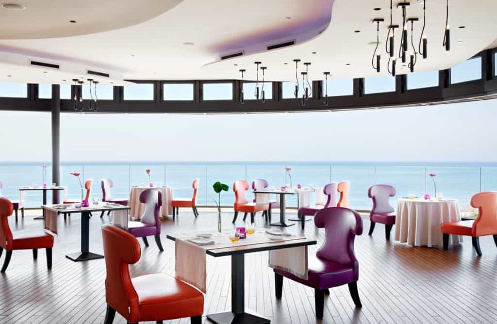 Purple and orange funky chairs in a restaurant