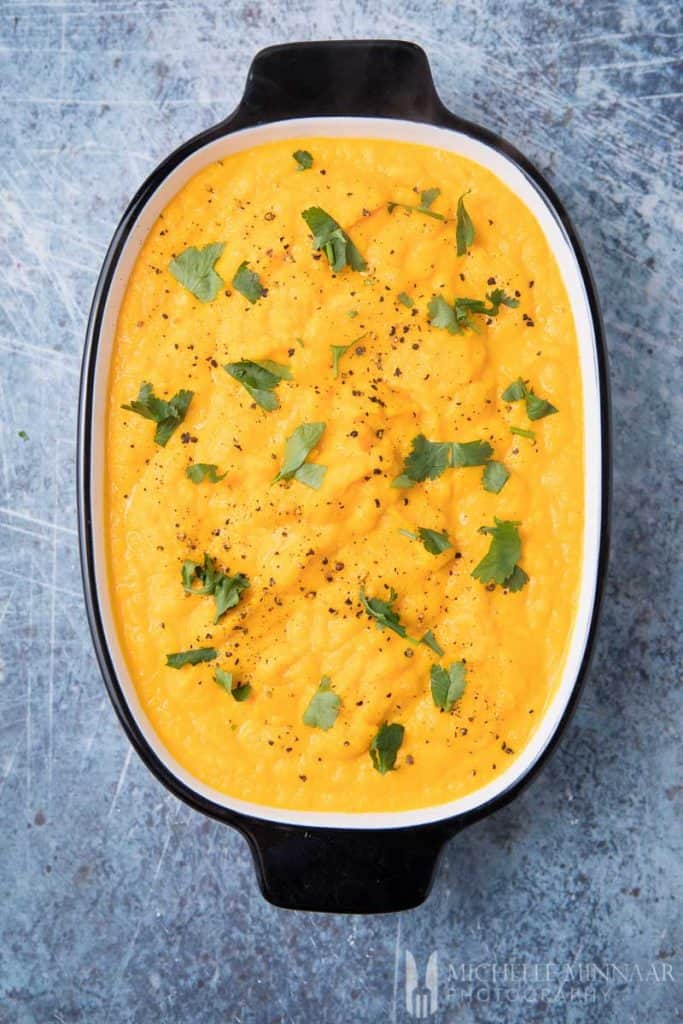 carrot and turnip mash in a pot