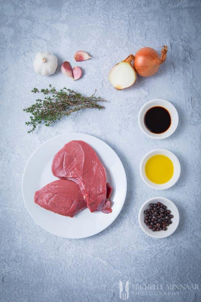 Ingredients to make venison steak marinade on a counter 
