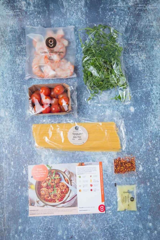 Ingredients to make chilli prawn pasta on a counter