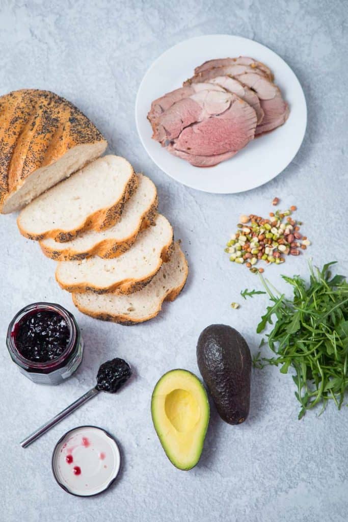 Ingredients to make a lamb sandwich, lamb, bread, avocado 