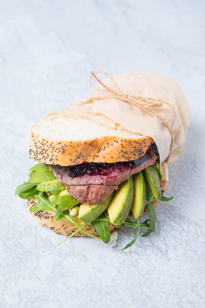 A lamb sandwich, lamb and avocado in bread