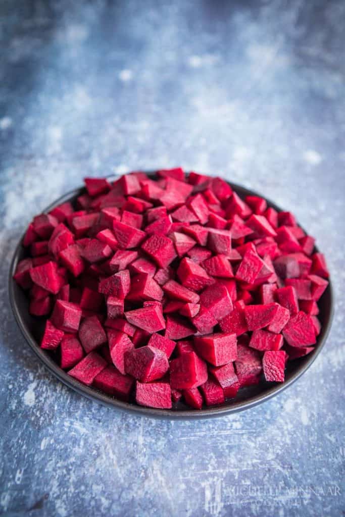 A bowl of purple beetroot cubes