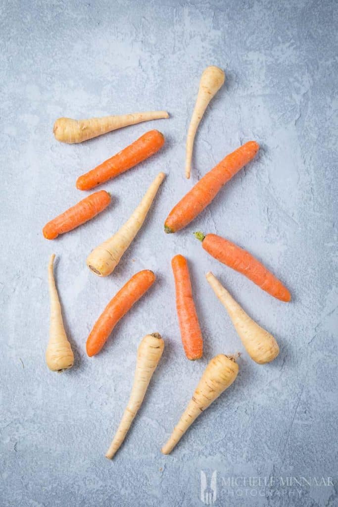 Parsnips and carrots on a counter