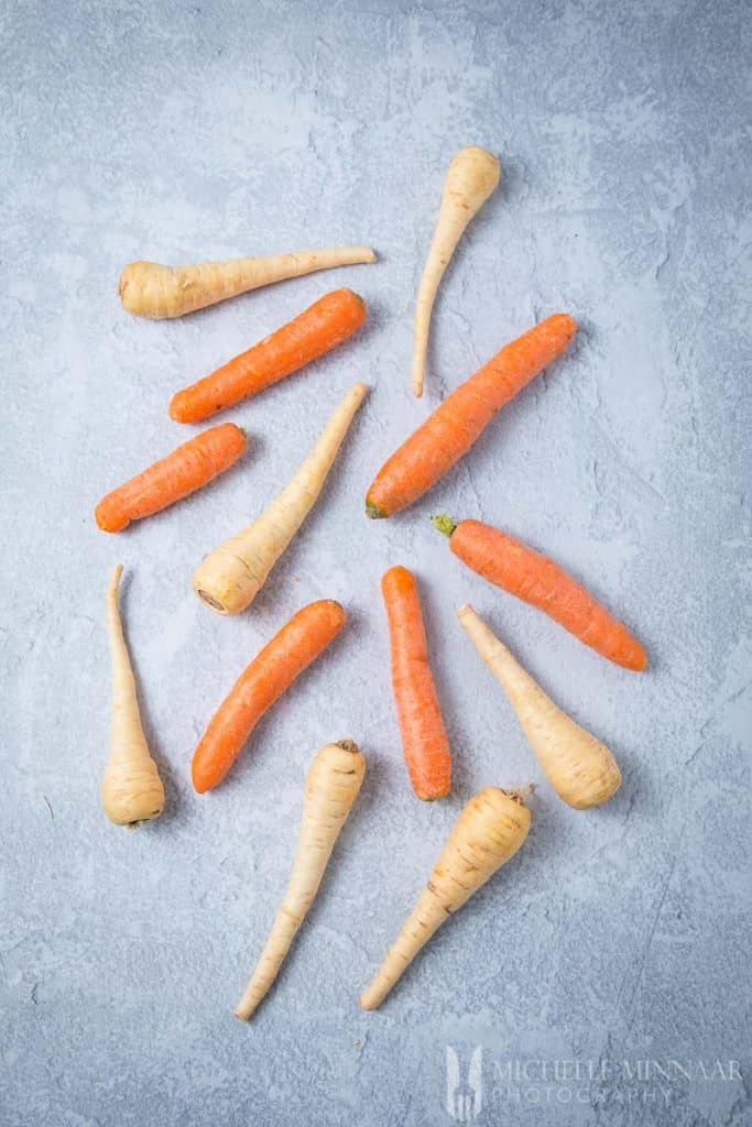 Parsnips and carrots on a counter