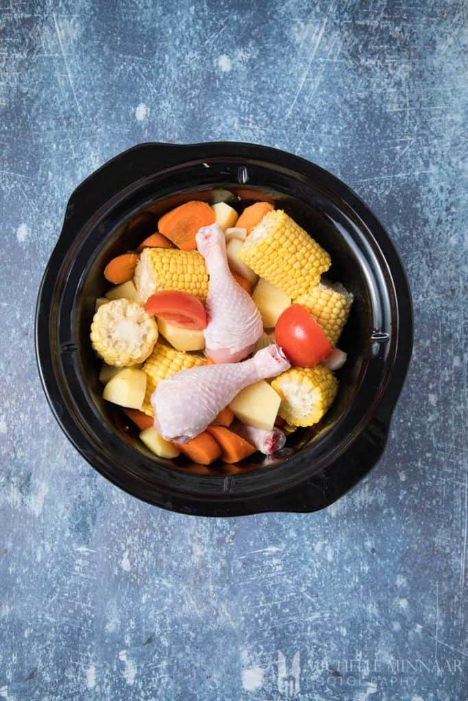 Raw soup ingredients in a crockpot