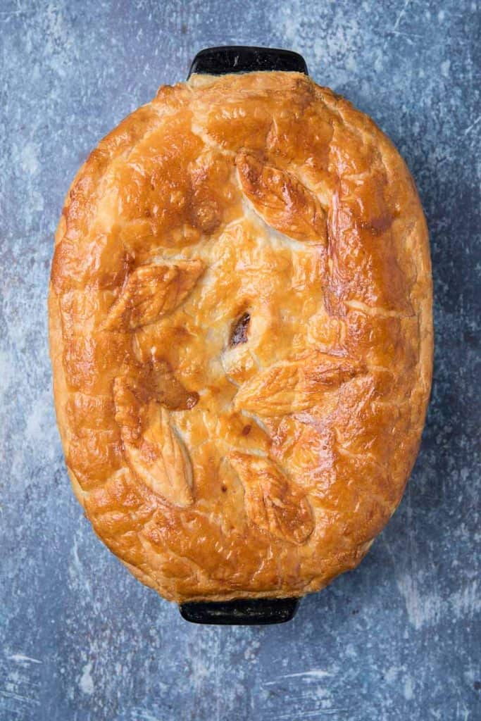 A completed baked game pie