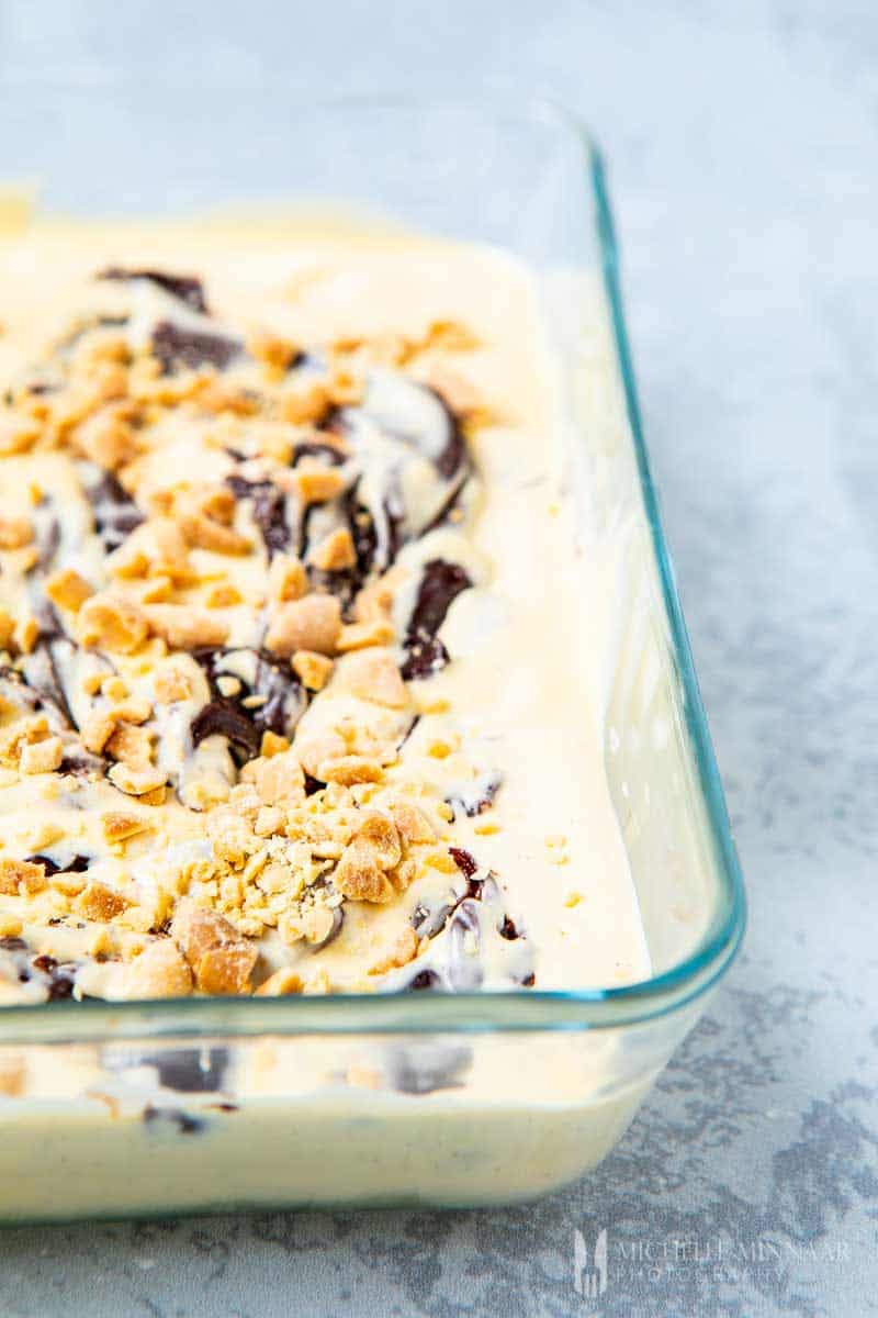 Close up of tin roof ice cream in a glass dish 