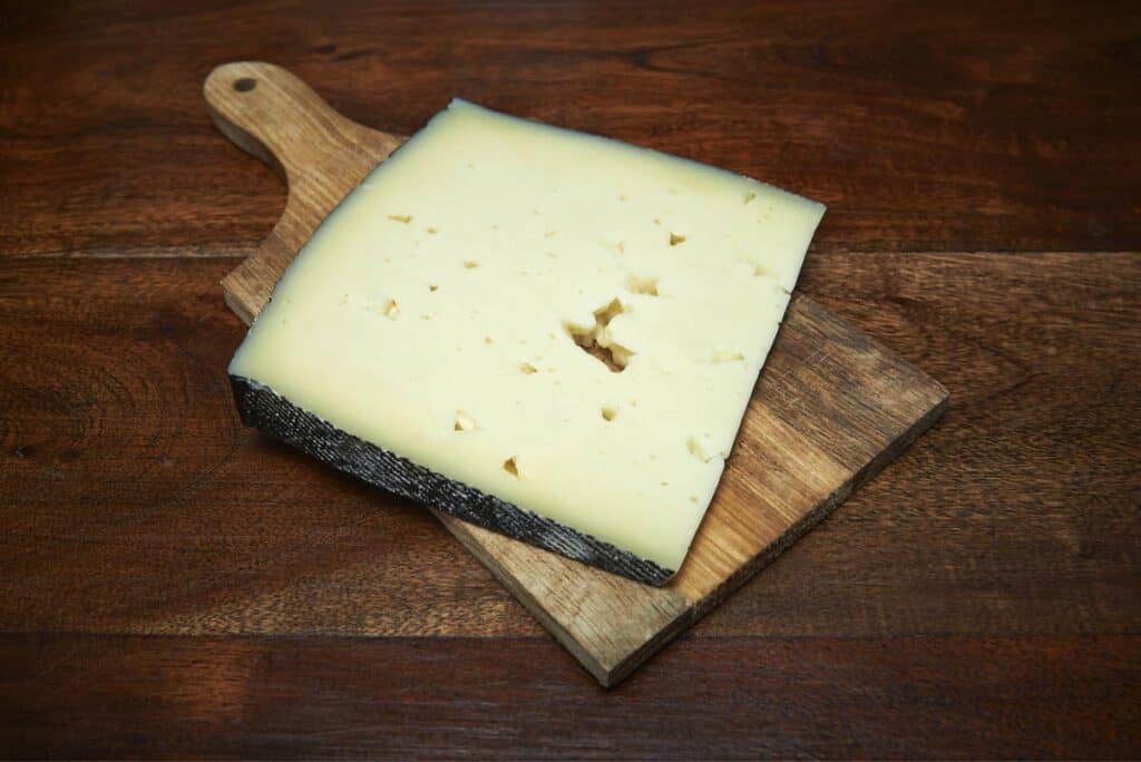 A slice of asiago cheese