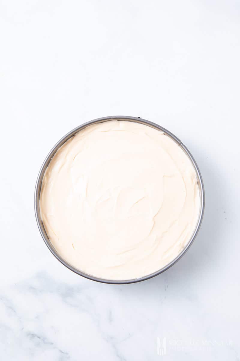 cream cheese frosting in a pan 