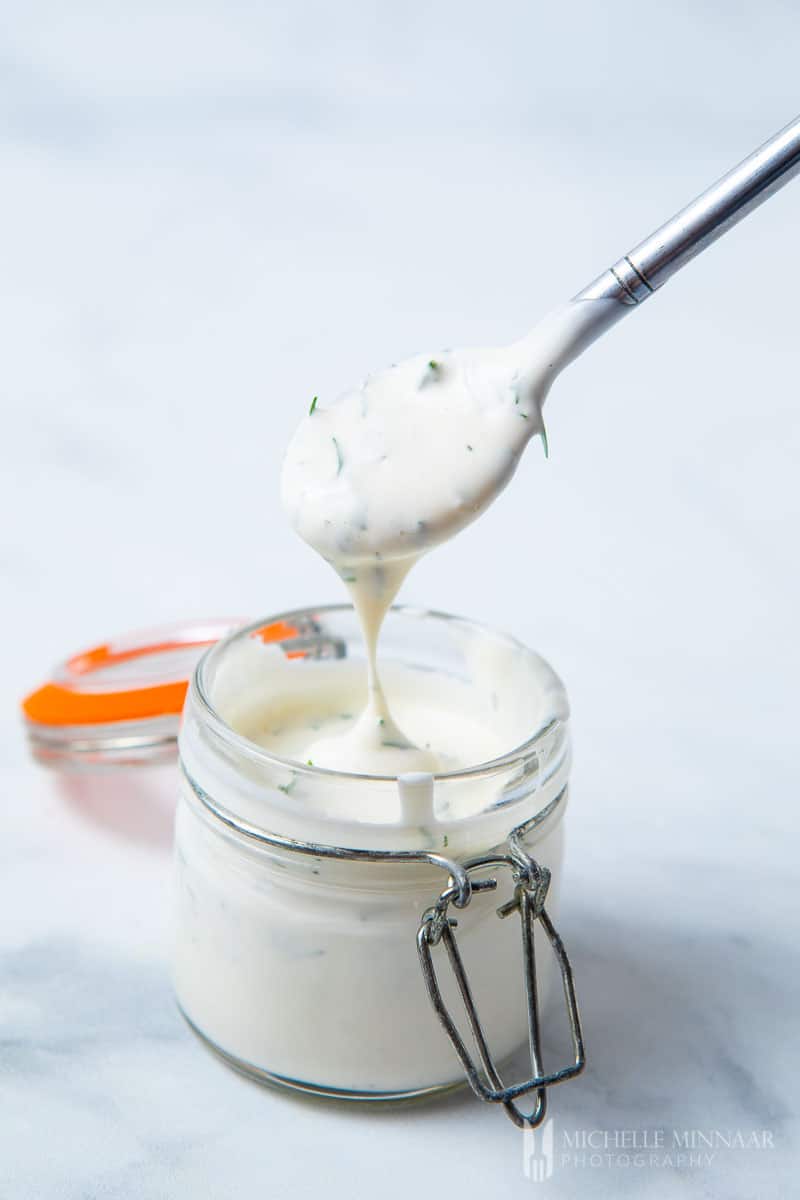 A white spoonful of ranch sugar free salad dressing