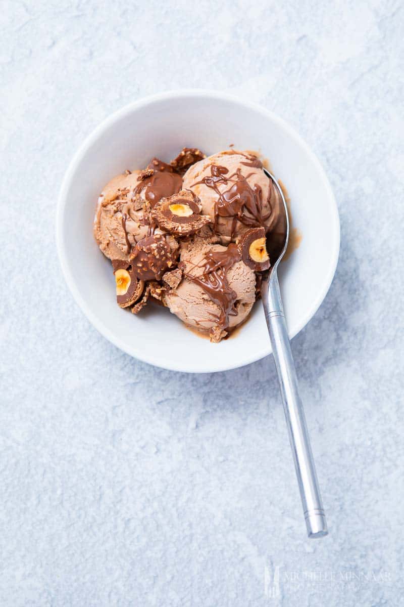A bowl of chocolate ferrero rocher ice cream