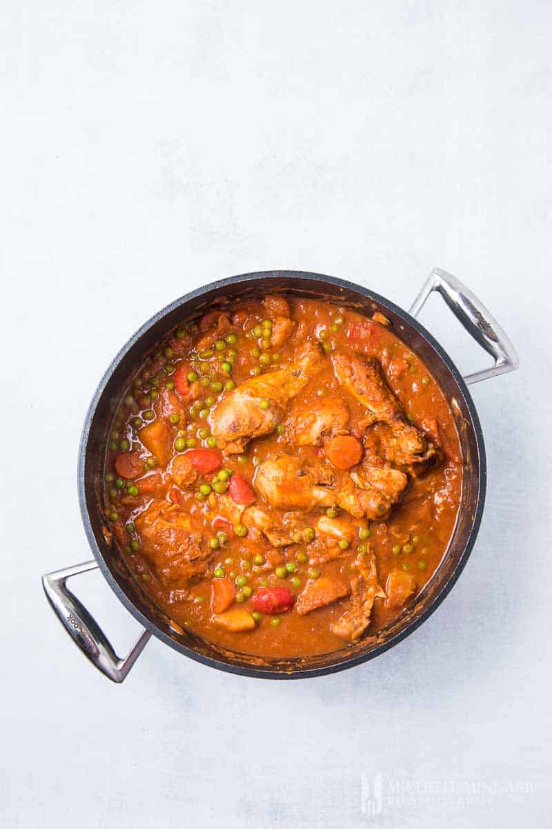 A stock pot of chicken stewing