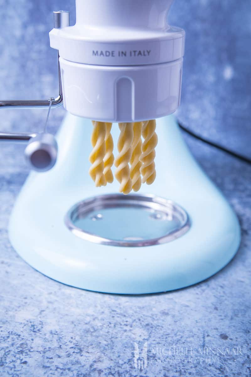 Fresh pasta coming out of the mixer
