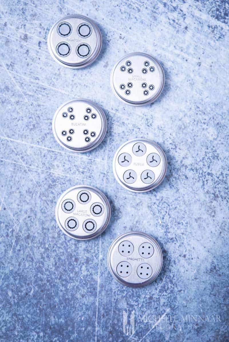 Metal pasta makers in different shapes