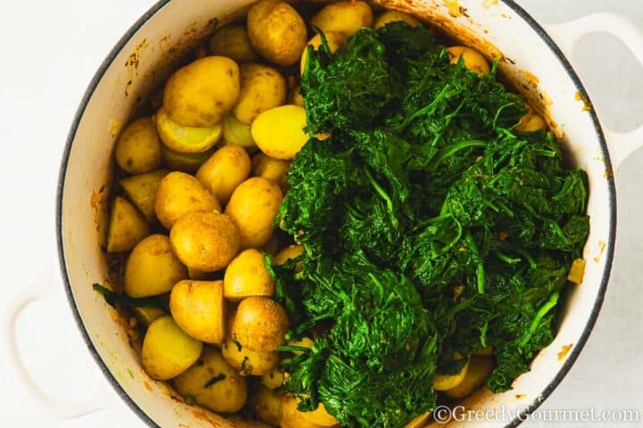 Pot with potatoes and spinach.