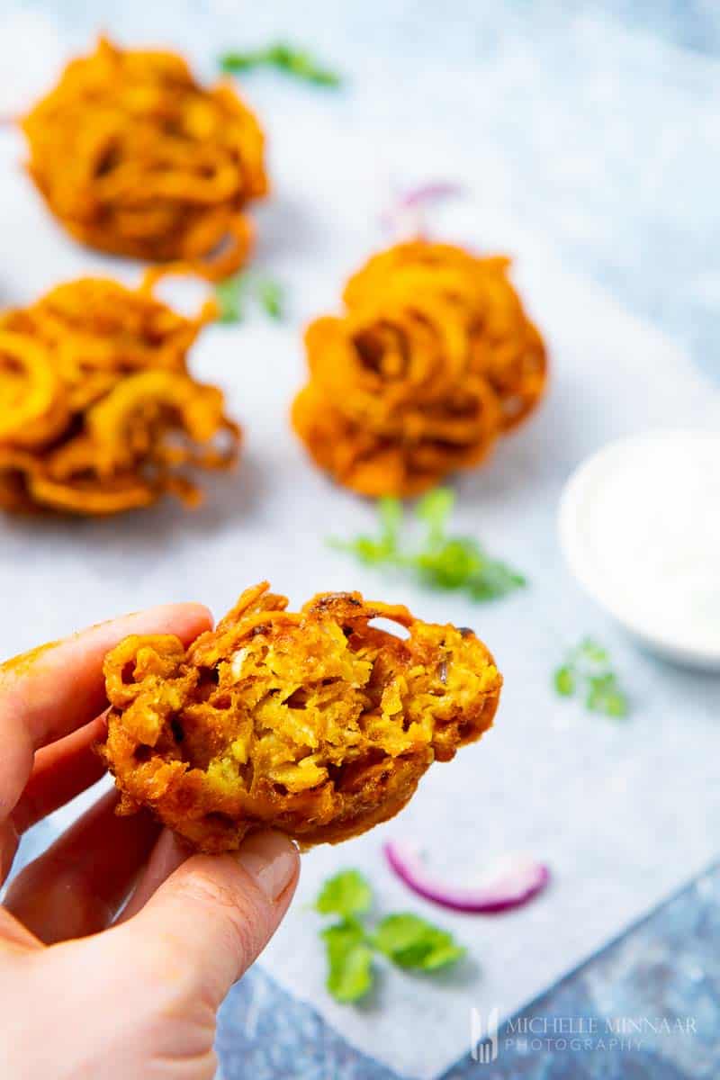 Fried orange potato bhajis