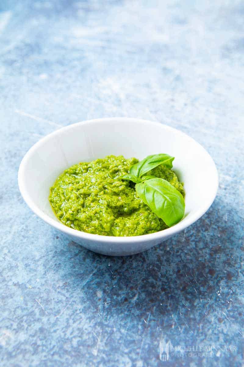 A bowl of green dairy free pesto