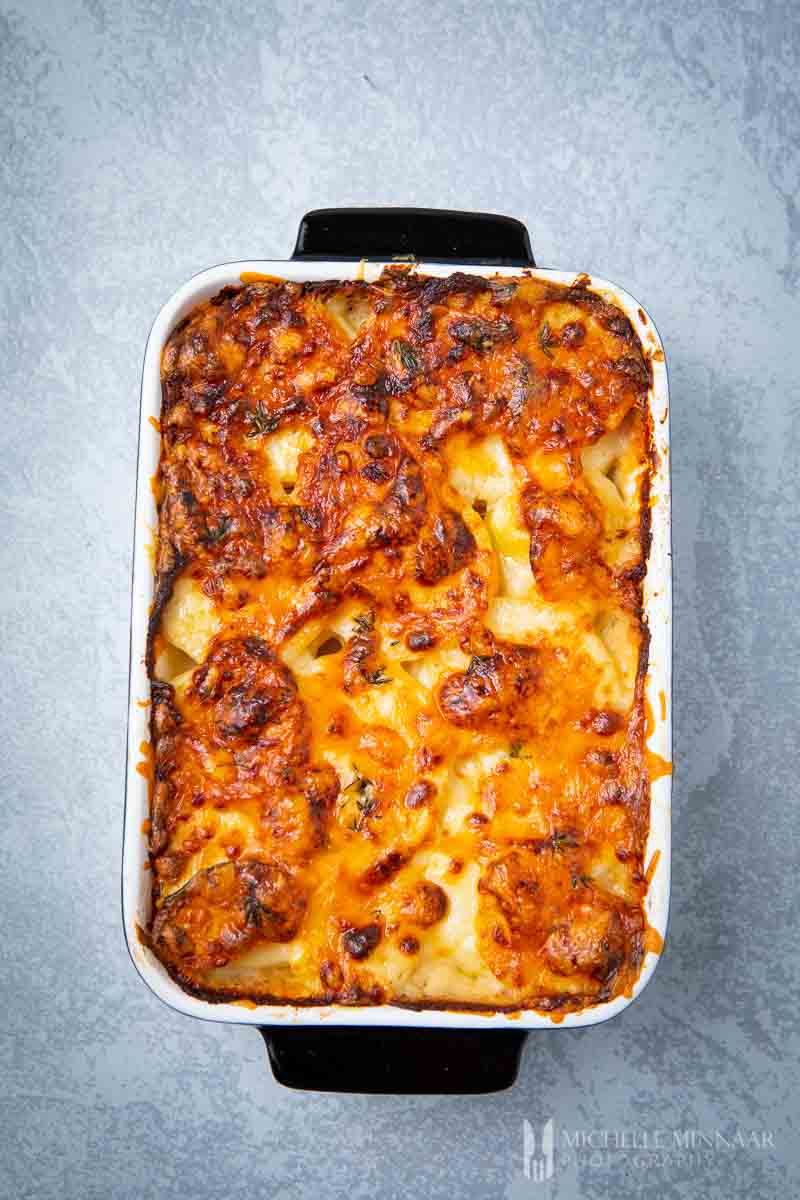 A casserole dish of gluten free scalloped potatoes