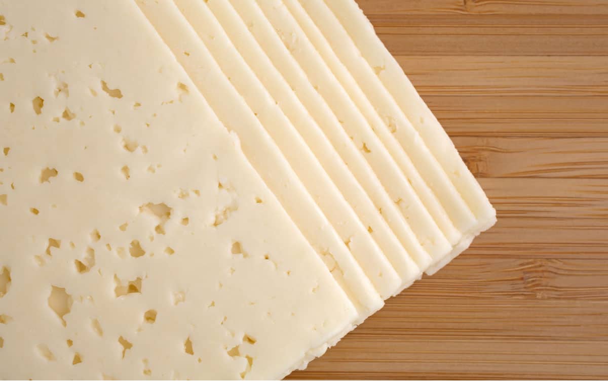 Slices of white havarti cheese