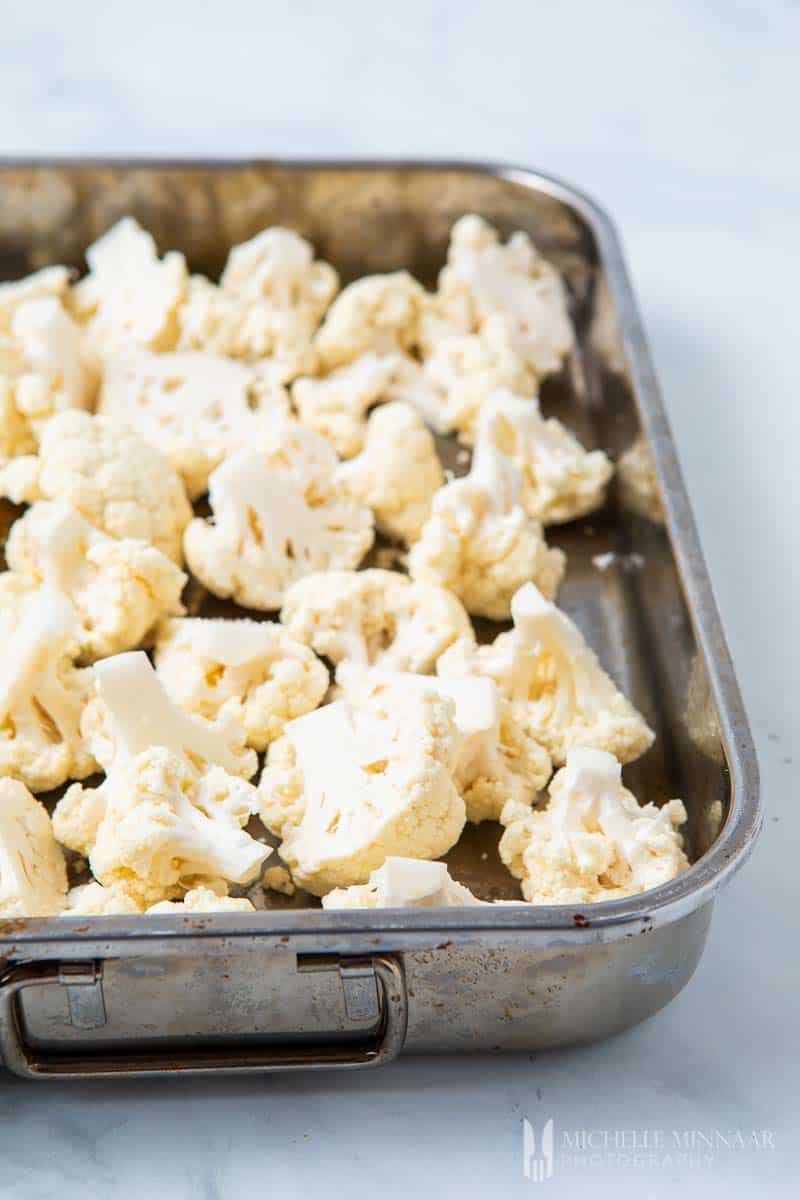 Cauliflower Florets in a silver pan 