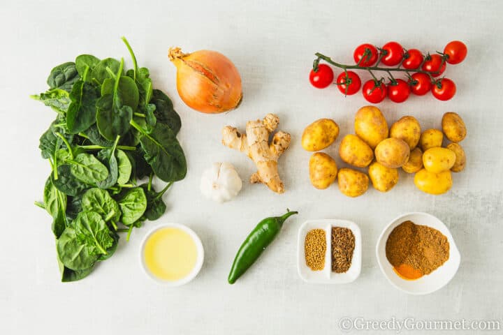 ingredients for saag aloo.