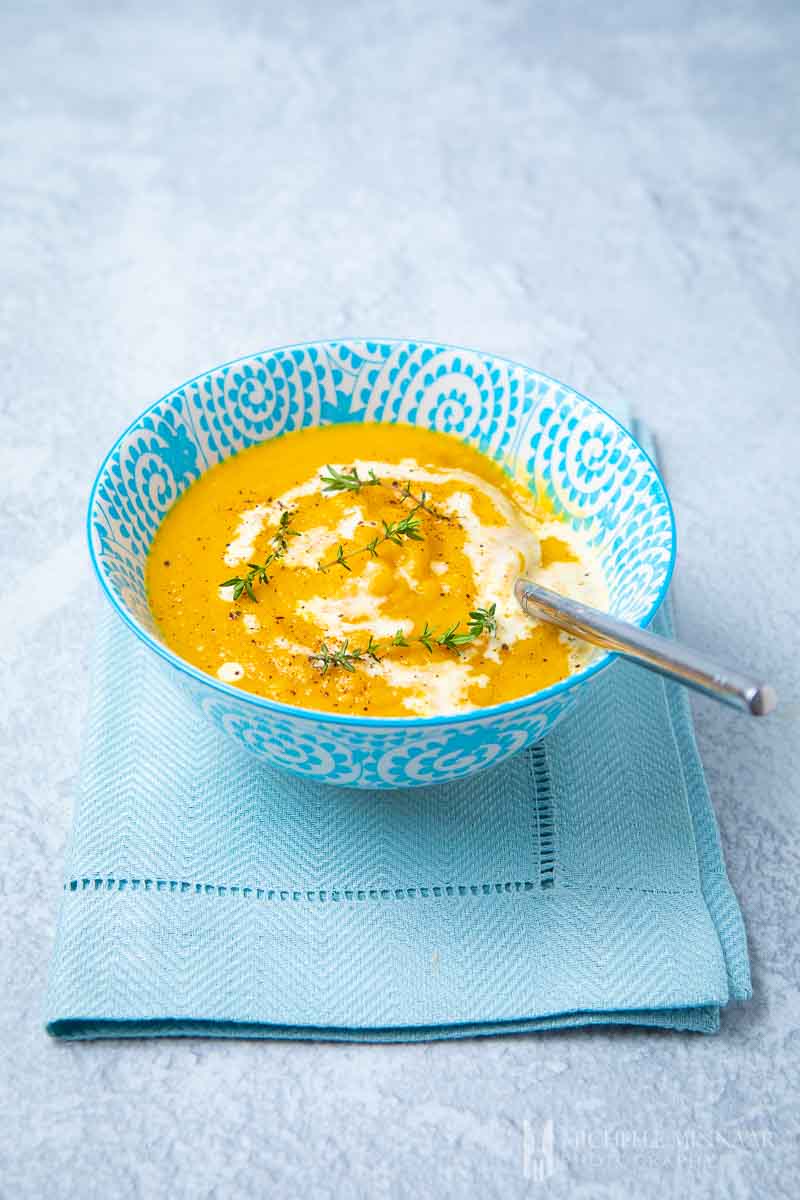 A bowl of orange swede soup